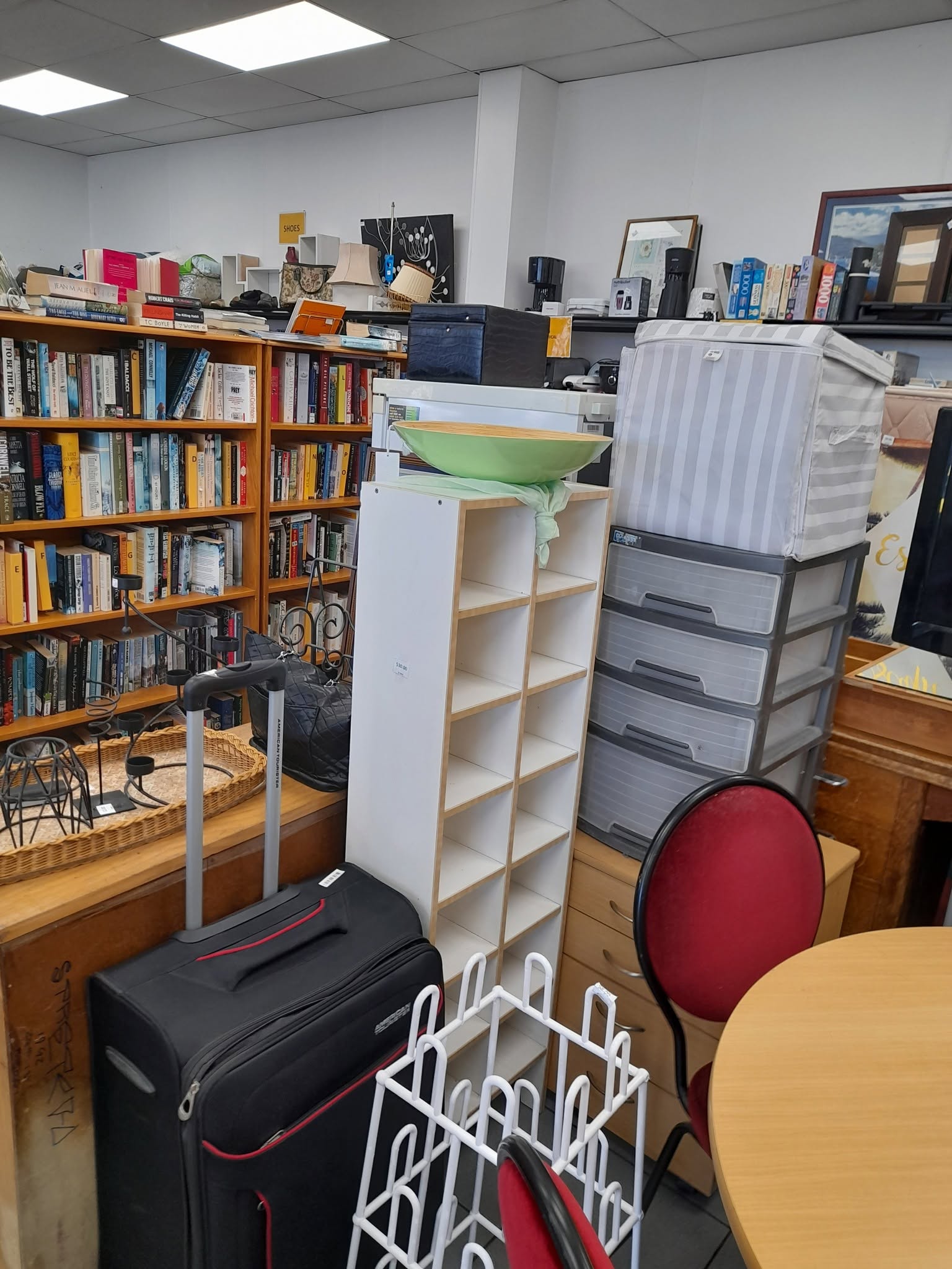 New furniture and homewares are in store at St John Ferry Road, including a rimu display cabinet priced at $275. Clothing is buy two items and get a third item of equal or lesser value free.