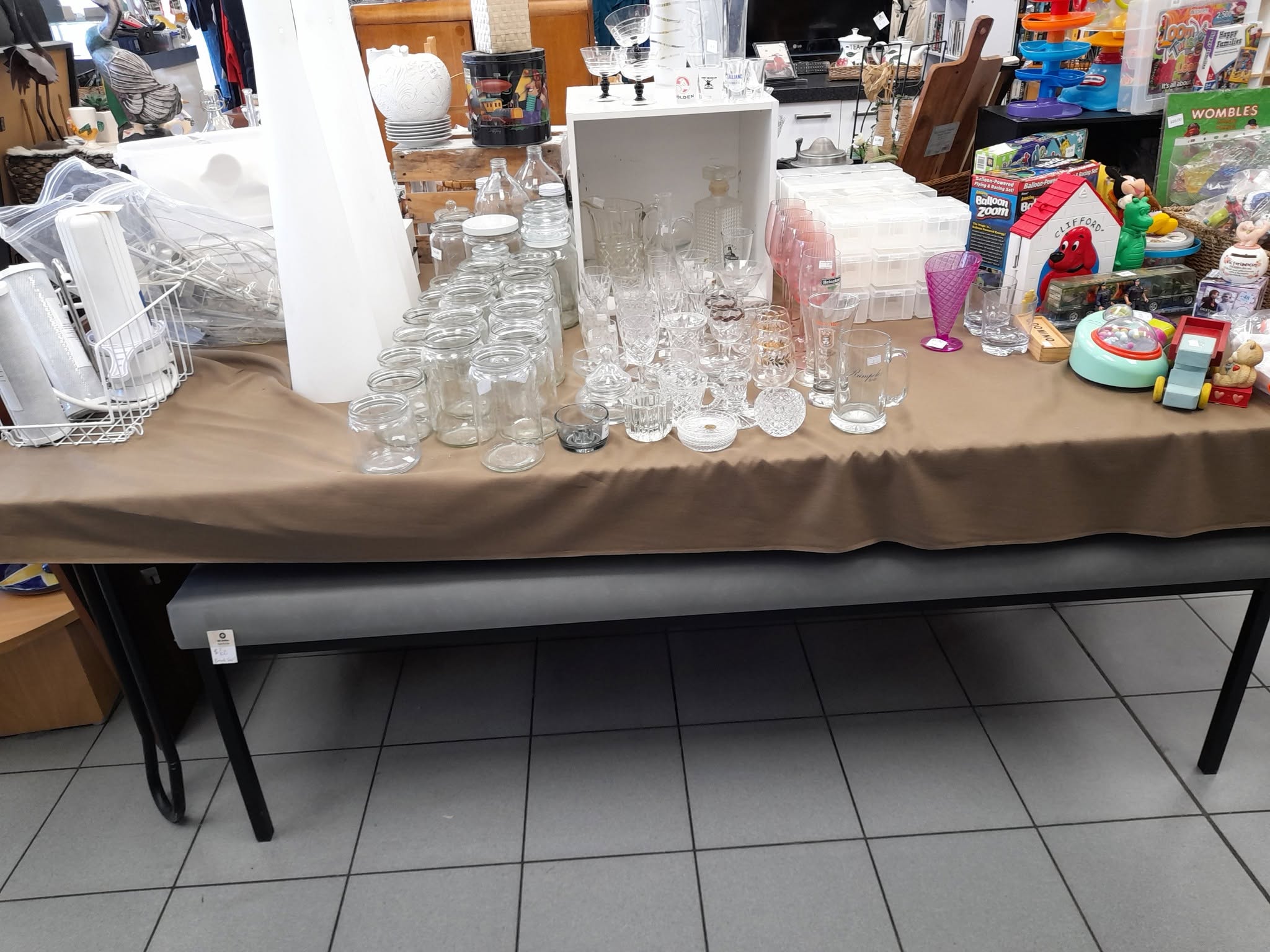 New furniture and homewares are in store at St John Ferry Road, including a rimu display cabinet priced at $275. Clothing is buy two items and get a third item of equal or lesser value free.