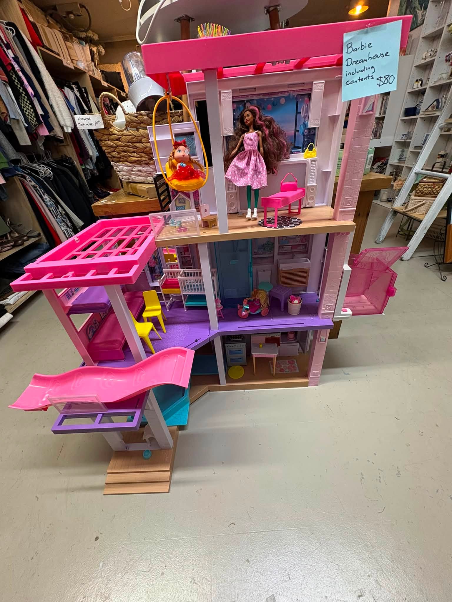 Vintage and old-tech finds are in store at Coastal Treasures, including corded telephones, toys, homewares, clothing and a Barbie Dreamhouse priced at $80.