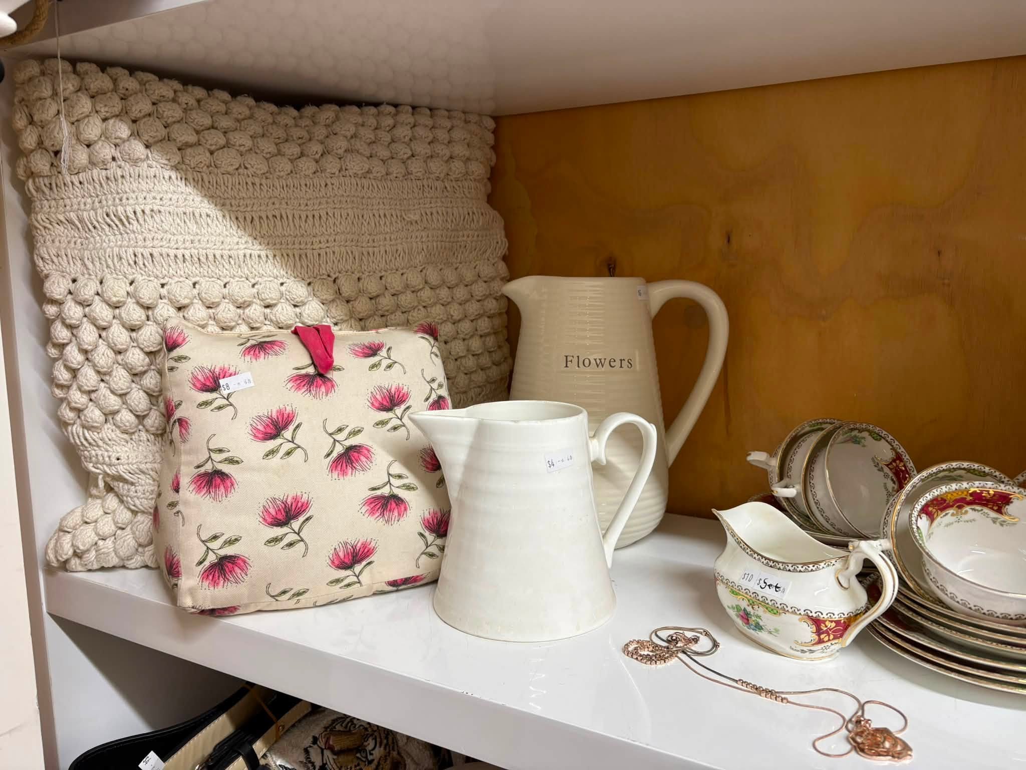 Vintage and old-tech finds are in store at Coastal Treasures, including corded telephones, toys, homewares, clothing and a Barbie Dreamhouse priced at $80.