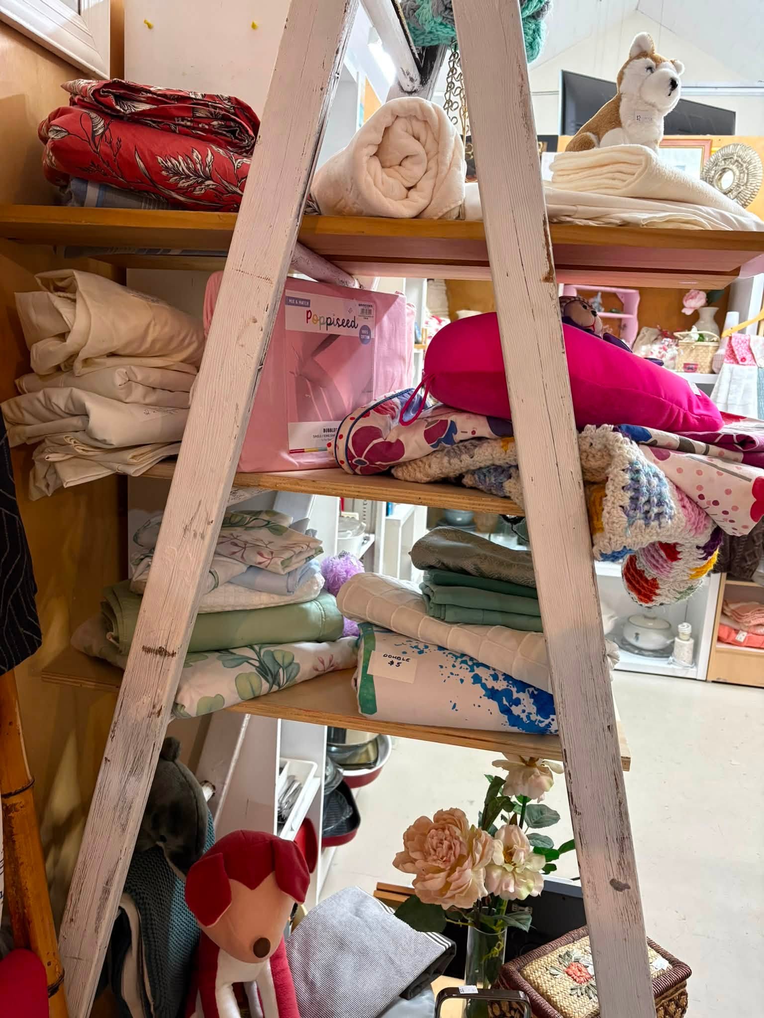 Vintage and old-tech finds are in store at Coastal Treasures, including corded telephones, toys, homewares, clothing and a Barbie Dreamhouse priced at $80.