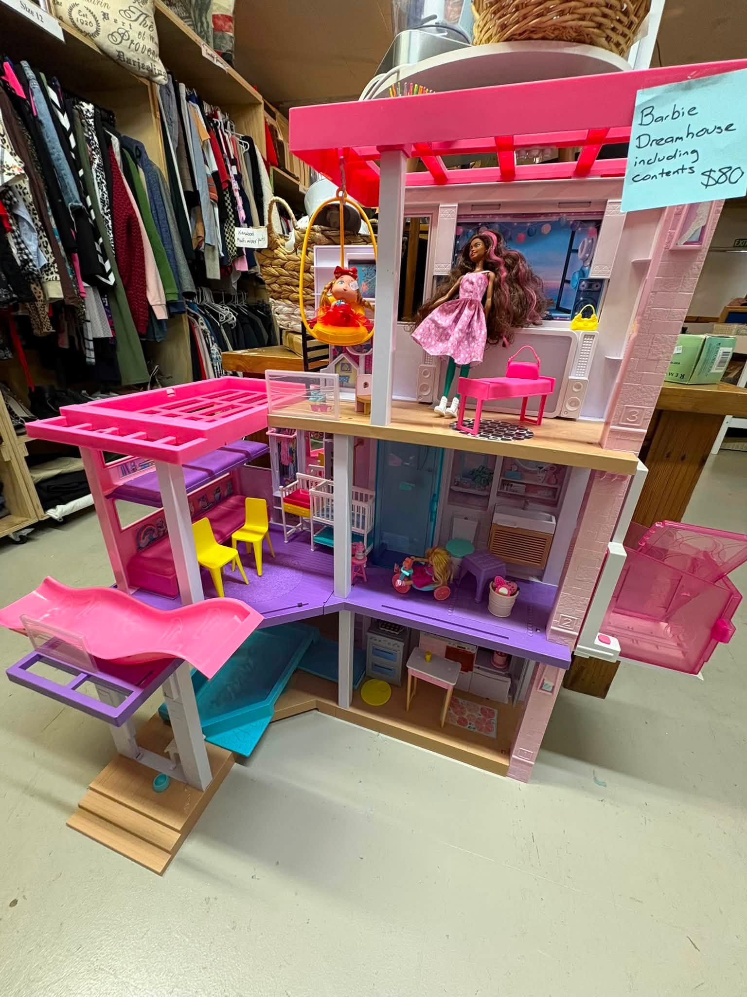 Vintage and old-tech finds are in store at Coastal Treasures, including corded telephones, toys, homewares, clothing and a Barbie Dreamhouse priced at $80.
