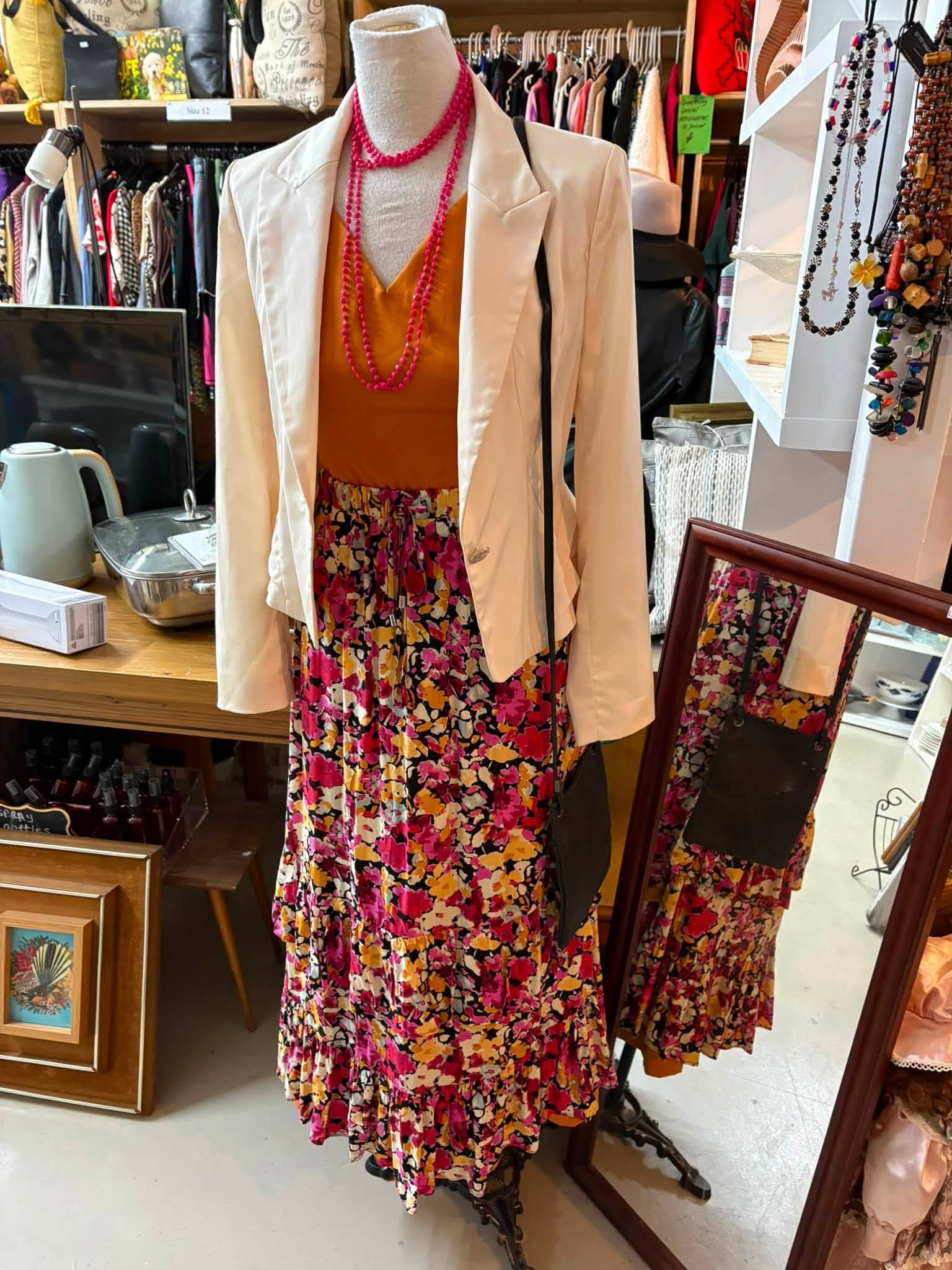 Vintage and old-tech finds are in store at Coastal Treasures, including corded telephones, toys, homewares, clothing and a Barbie Dreamhouse priced at $80.
