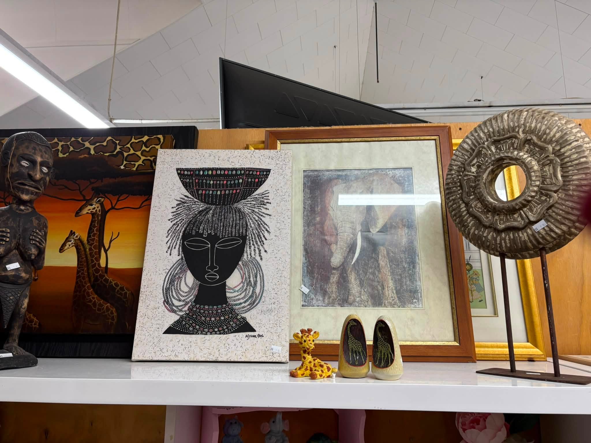 Vintage and old-tech finds are in store at Coastal Treasures, including corded telephones, toys, homewares, clothing and a Barbie Dreamhouse priced at $80.