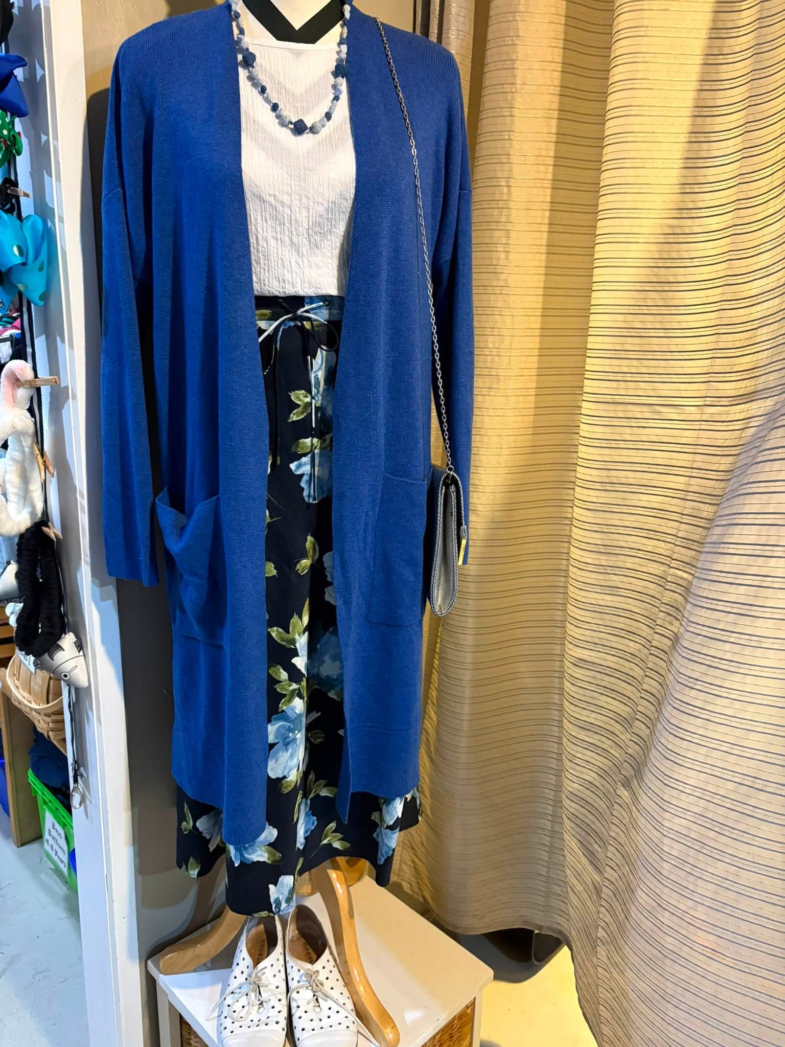 Vintage and old-tech finds are in store at Coastal Treasures, including corded telephones, toys, homewares, clothing and a Barbie Dreamhouse priced at $80.