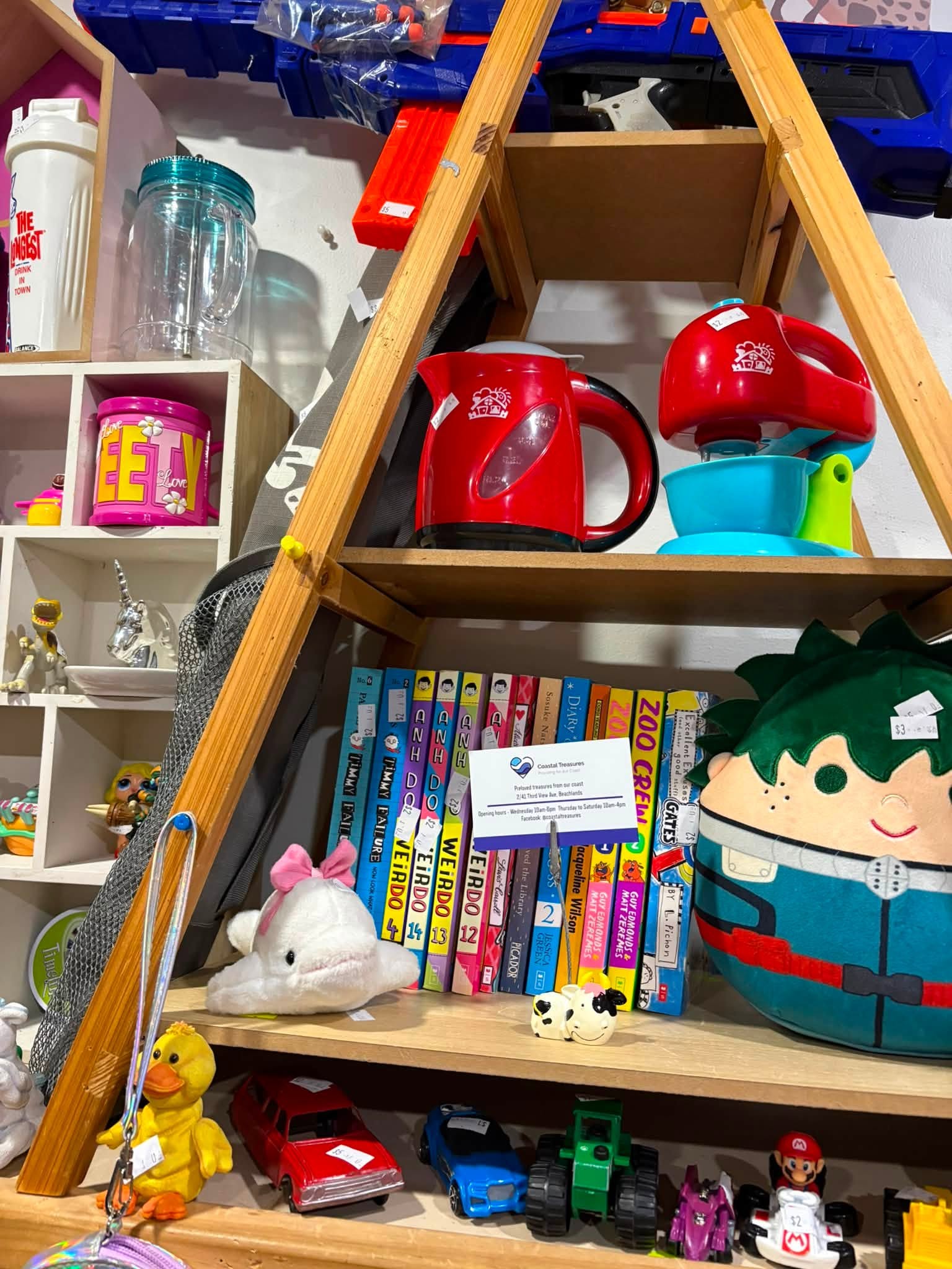 Vintage and old-tech finds are in store at Coastal Treasures, including corded telephones, toys, homewares, clothing and a Barbie Dreamhouse priced at $80.