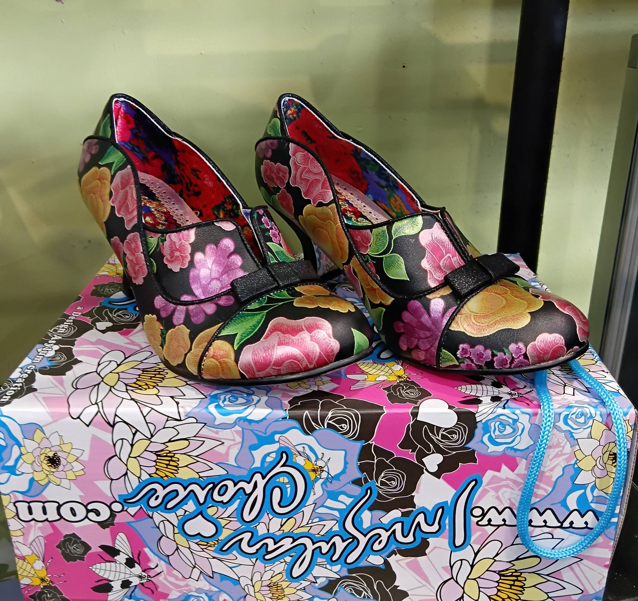 Fresh staff picks at St John Wairau Park Store include red boots, a biker jacket, floral shoes and a purple ceramic tea set.