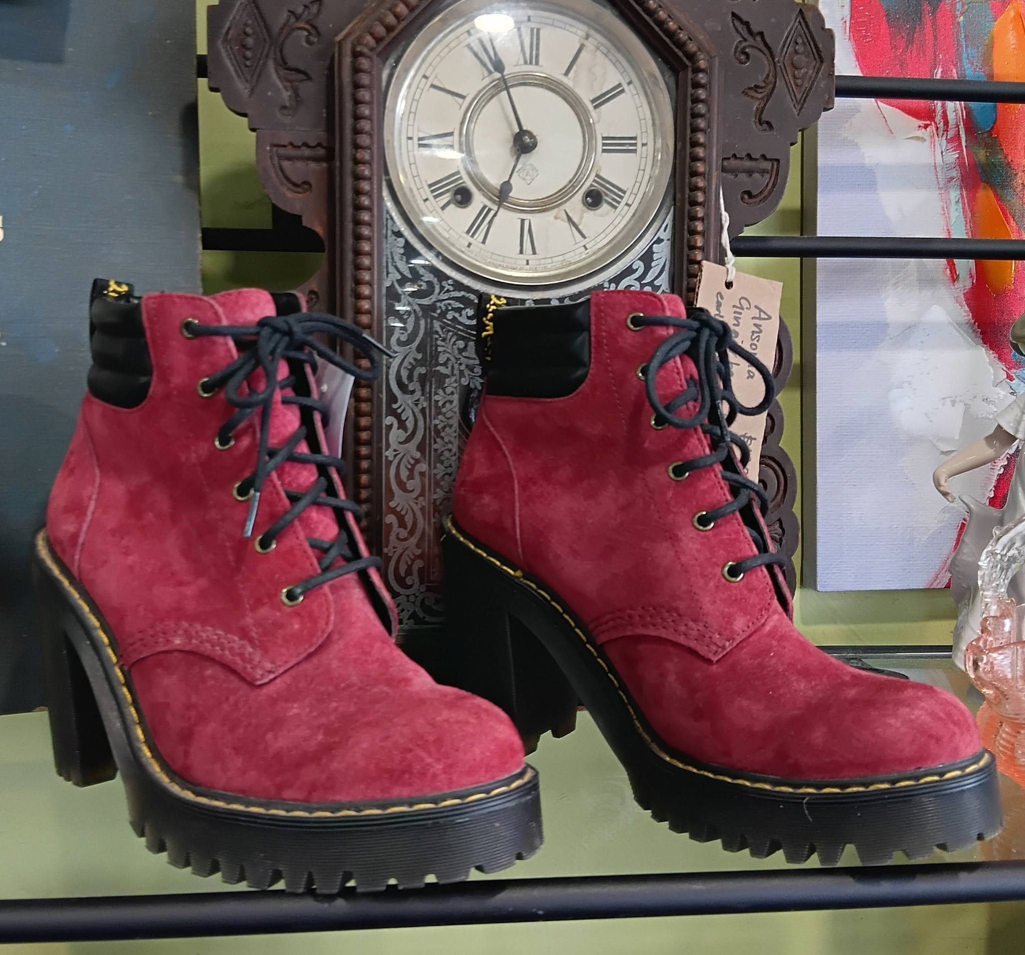 Fresh staff picks at St John Wairau Park Store include red boots, a biker jacket, floral shoes and a purple ceramic tea set.