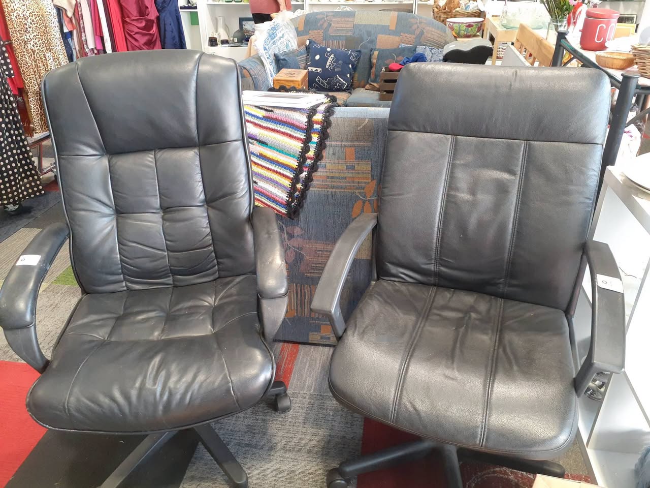 Two 2-seater sofas are $60 each and two computer chairs are $20 each at St John Waiuku Store.