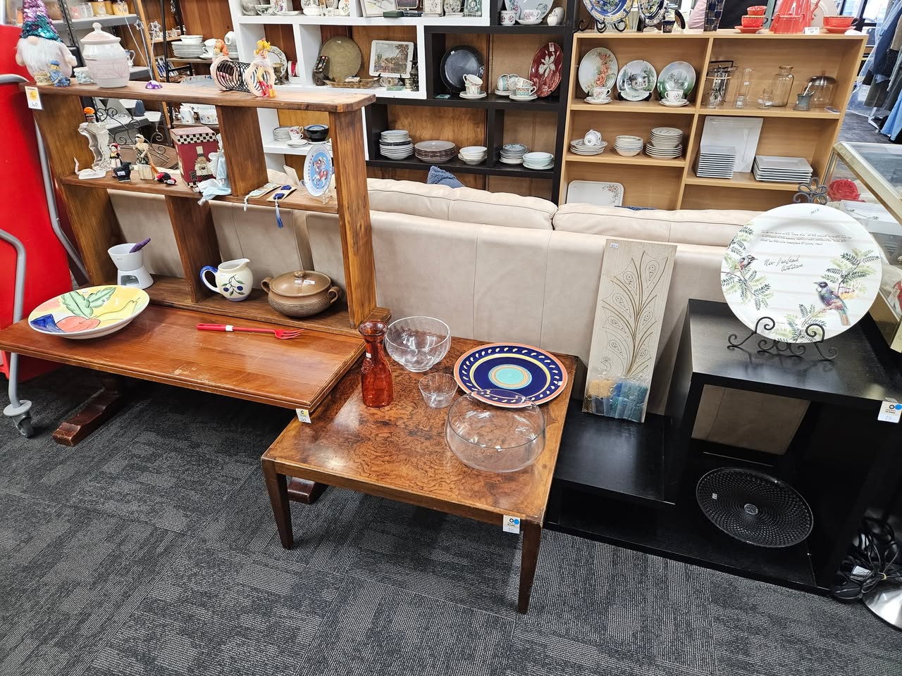 Fresh furniture and homewares are on the floor at St John Tauranga Store, including a cream leather two-seater couch for $80, a matching single-seater for $40 and a Sony Bravia television for $40.