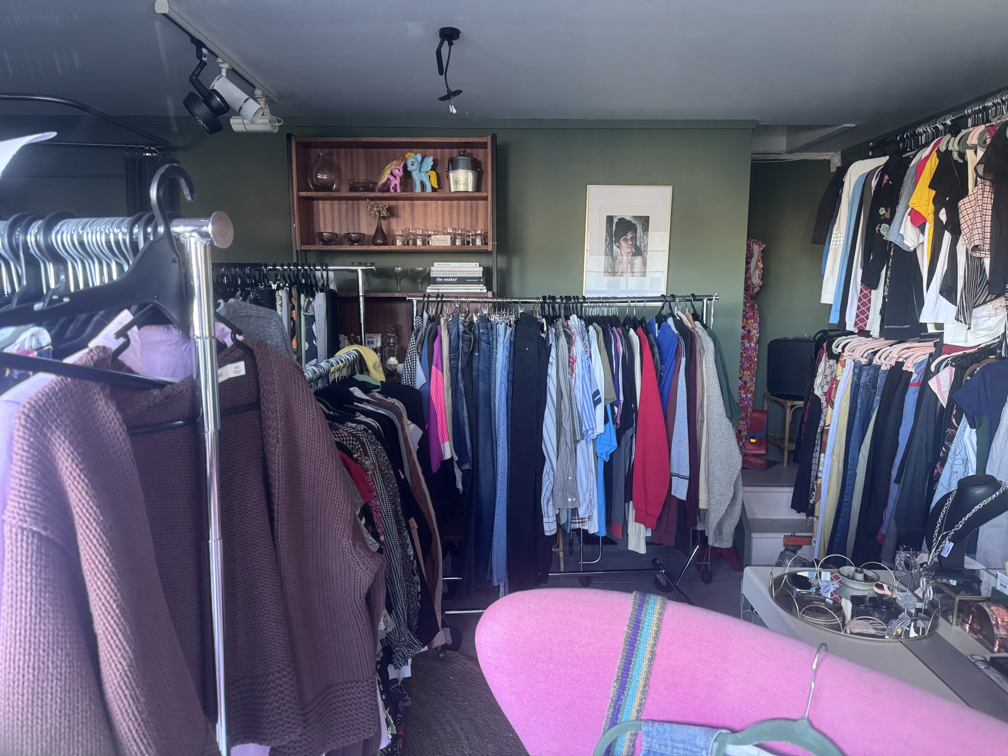 Little store with a few racks, limited hours.