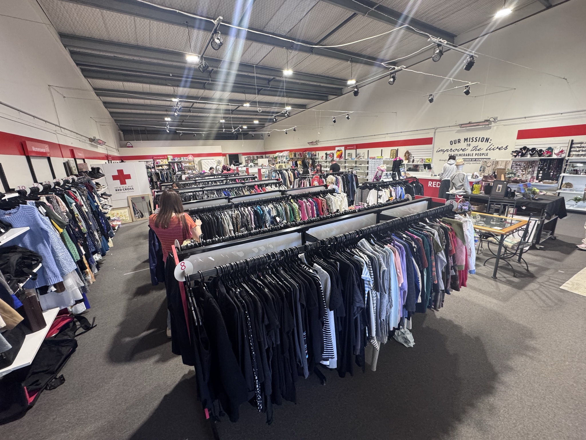 Massive store organised by size, lots of ladies and men’s wear, kids clothes, furniture and art