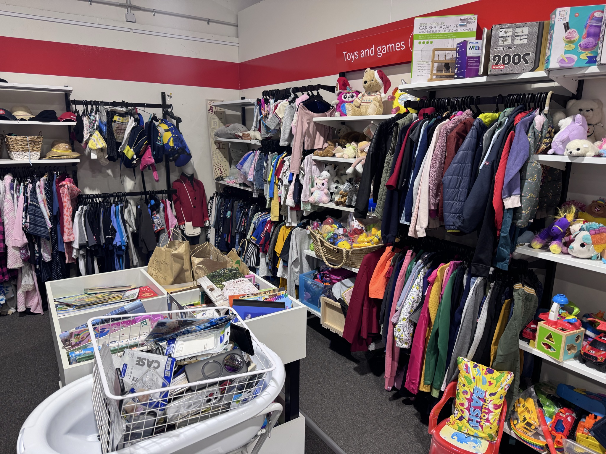 Massive store organised by size, lots of ladies and men’s wear, kids clothes, furniture and art