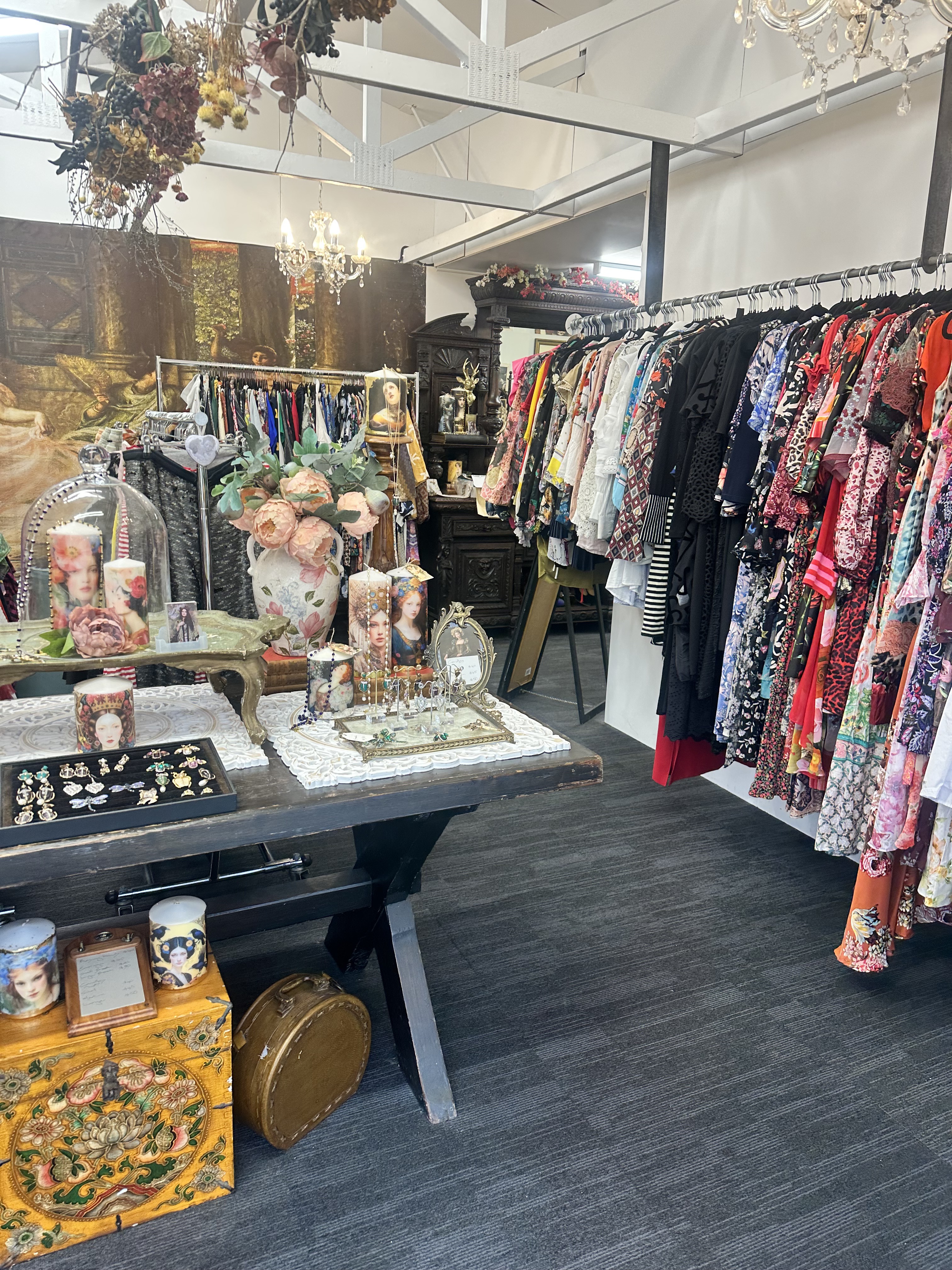 A peek inside Red Trinity 🌹 Racks of pre-loved and vintage fashion, hand-picked jewellery and our signature art candles, all styled in our little gallery by the beach. Over winter we're open by appointment — get in touch and come treasure-hunt.
