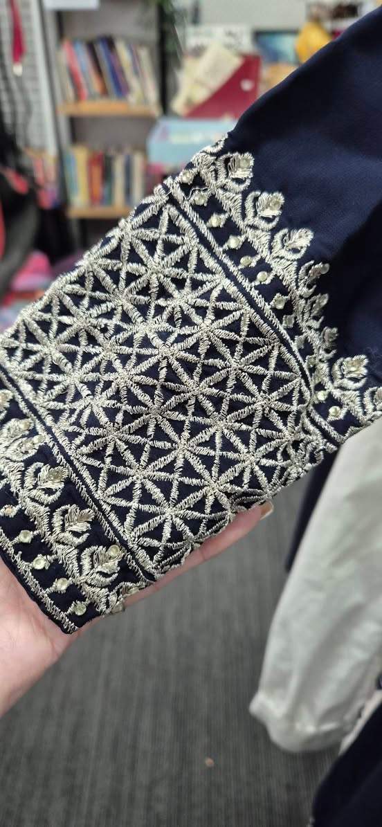 Beautiful Navy Blue with elegant silver edging.
Girls 8 to 10.