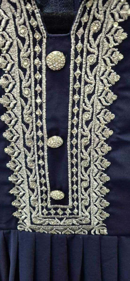 Beautiful Navy Blue with elegant silver edging.
Girls 8 to 10.