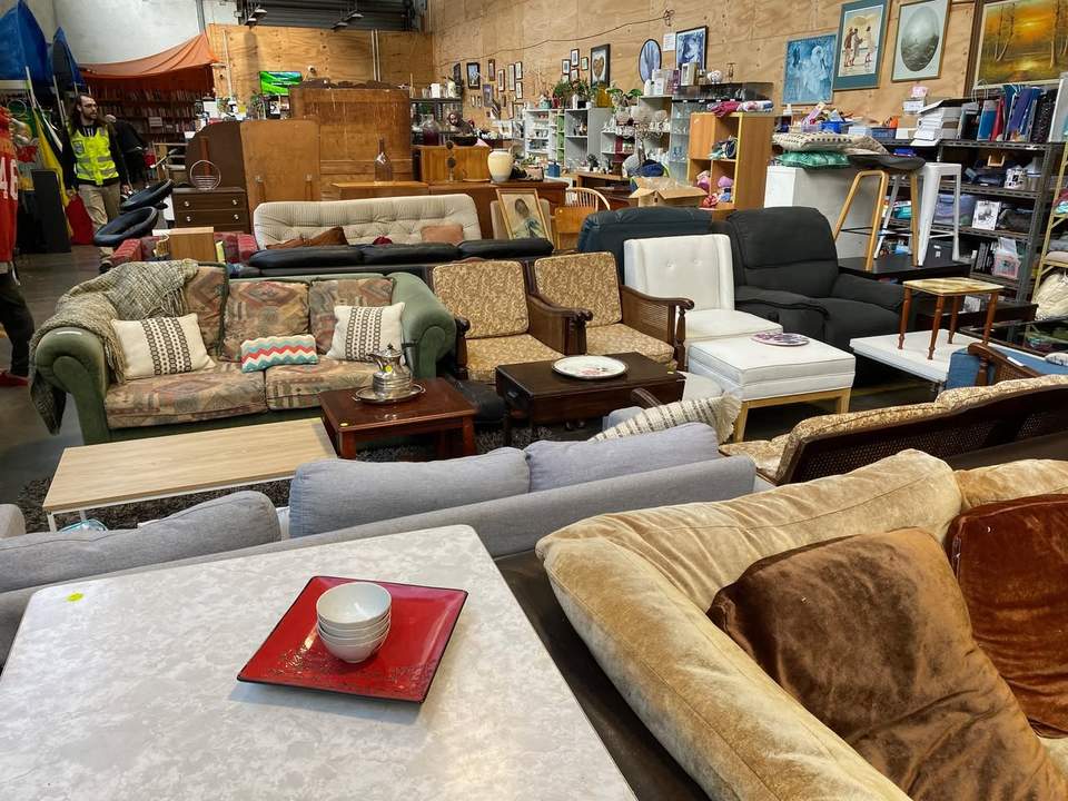 Couches reduced to clear from $10 to $80, plus half-price saucepans, were available at EarthLink Inc.