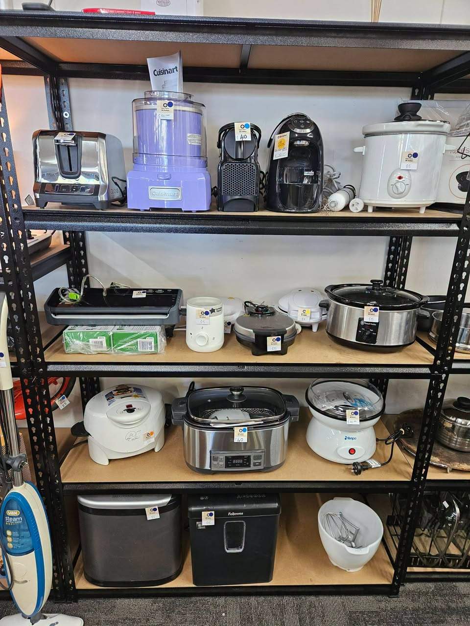 St John Tauranga’s electrical shelves are loaded with appliances and kitchenware.