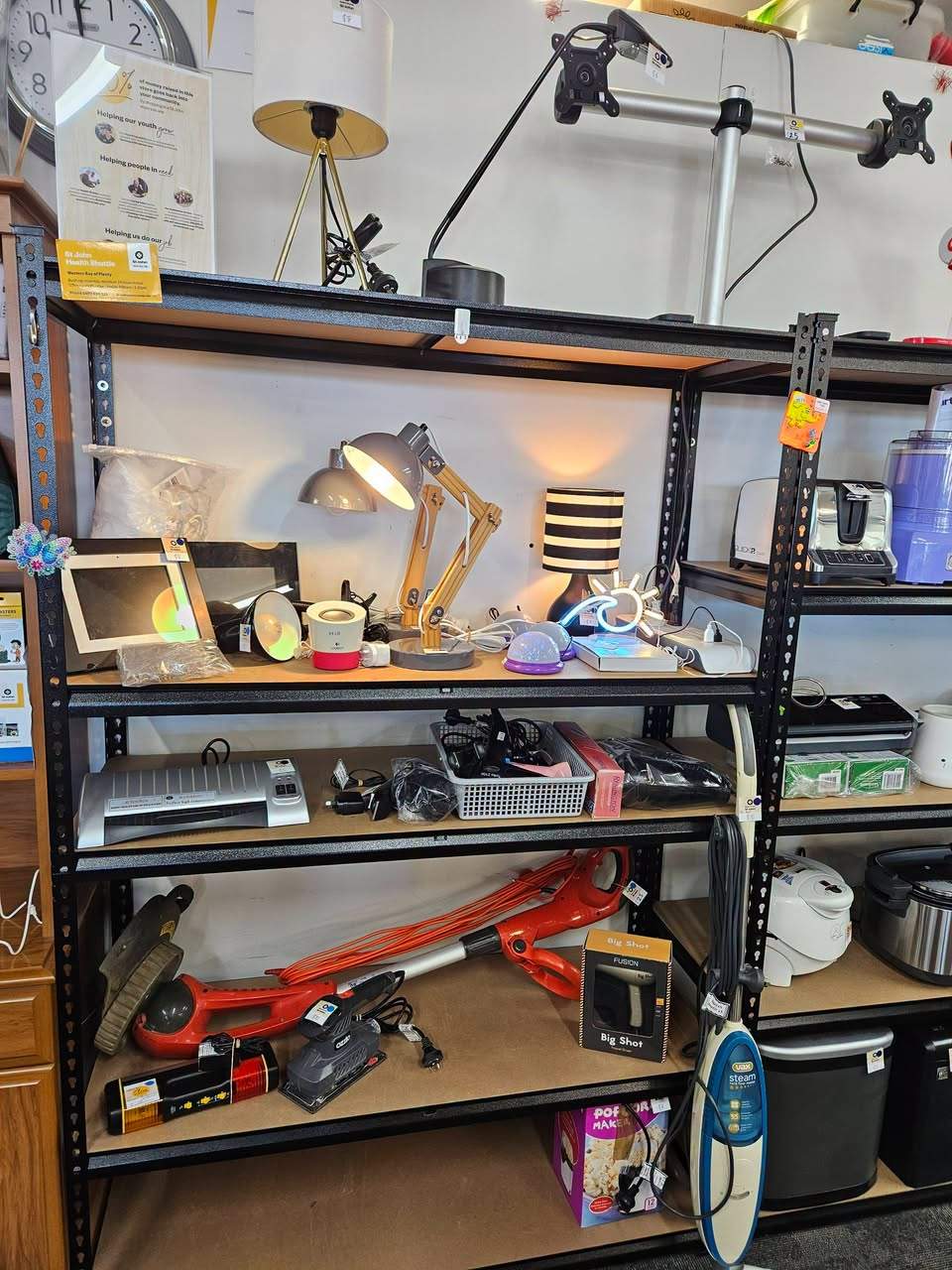 St John Tauranga’s electrical shelves are loaded with appliances and kitchenware.