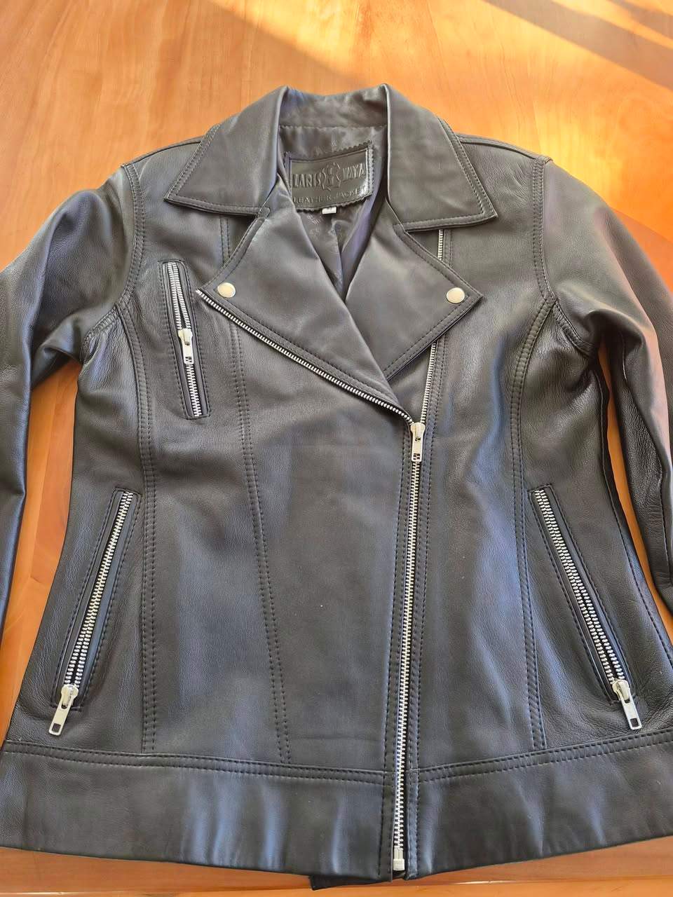We received this beautiful leather jacket as a donation. I would like to give you as our followers  first opportunity to buy it. It is still in a great condition.
It is available for viewing at the Op Shop, weekdays 9h00 till 13h00. Ask for Riana, I keep it at the back.
Details:
Laris Jaya Leather Jacket
Dormeuil England
Soft black leather
Size M
$ 70