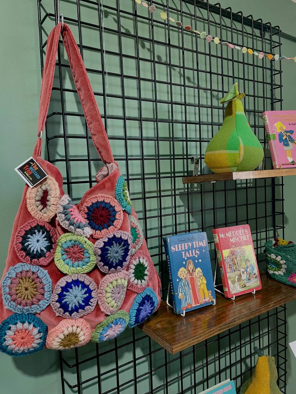Here’s a selection of our lovely Spring collection- available on both our feature wall and cafe corner tomorrow! Lots of upcycled textiles, wool blanket off cuts turned into doorstops and bunting, donated crocheted circles reimagined in various gorgeous ways… handmade tapestries and stitcheries as well as lovely spring items that will bring a freshness to your home after the winter cold! Why not usher in the new season with something special from The Mustard Tree🌼🌸🧡