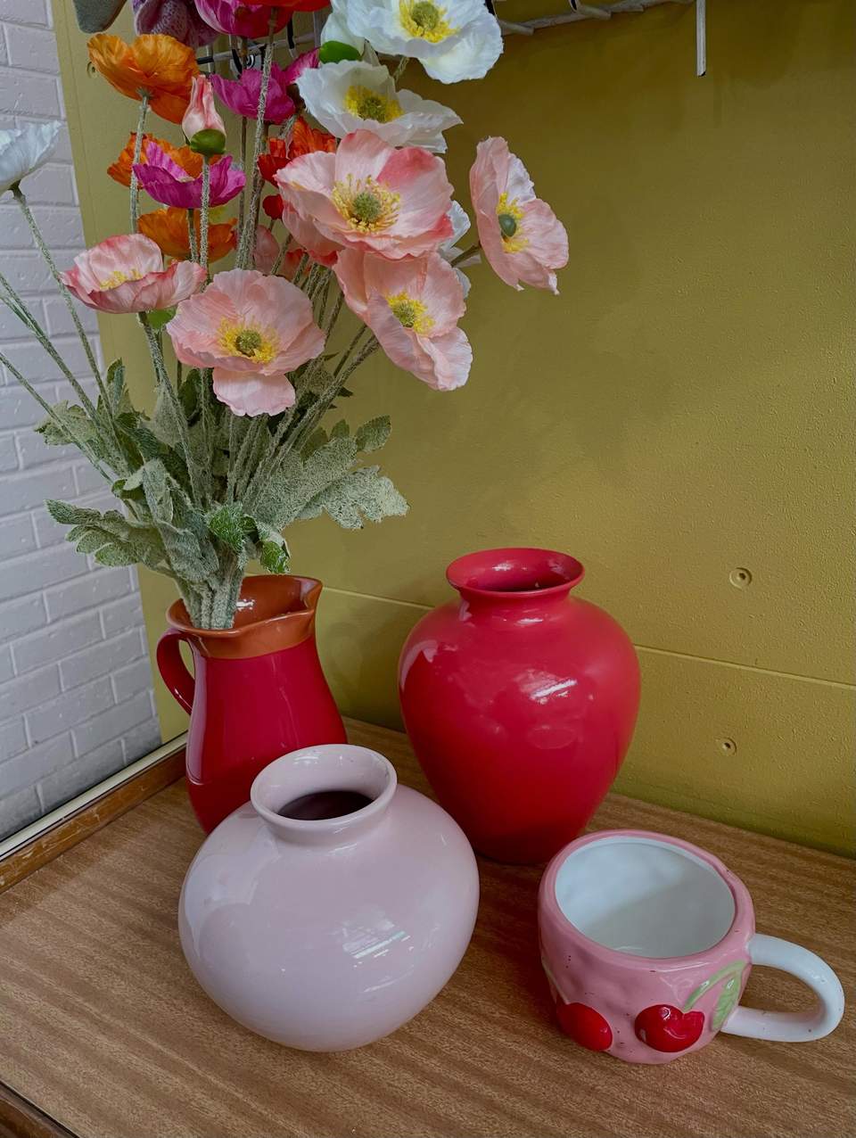 Here’s a selection of our lovely Spring collection- available on both our feature wall and cafe corner tomorrow! Lots of upcycled textiles, wool blanket off cuts turned into doorstops and bunting, donated crocheted circles reimagined in various gorgeous ways… handmade tapestries and stitcheries as well as lovely spring items that will bring a freshness to your home after the winter cold! Why not usher in the new season with something special from The Mustard Tree🌼🌸🧡