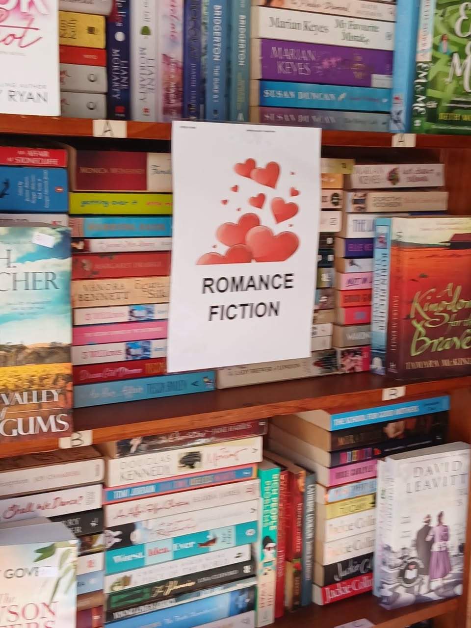 Looks what new at HHS Book Shed. A section full of romance and easy reads. Great for an escape.