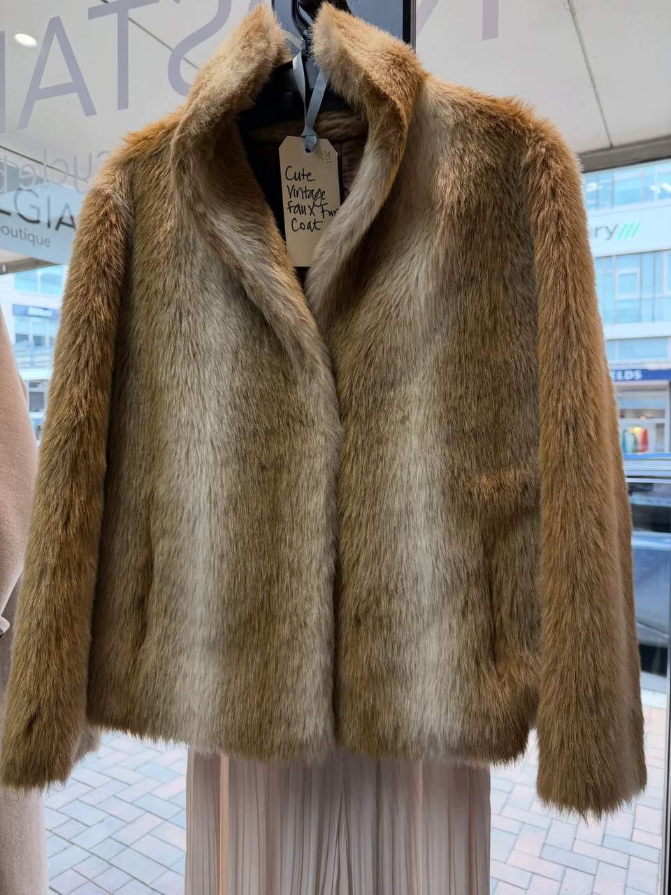 A vintage faux-fur coat is among the finds at Nostalgia Designer Recycle.