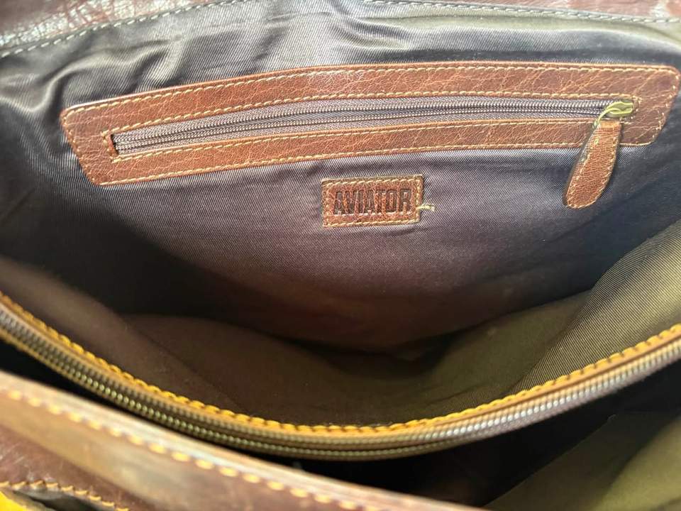 Good-quality unisex leather Aviator satchel in excellent condition, approximately 39 × 28 cm, offered in store for $115.