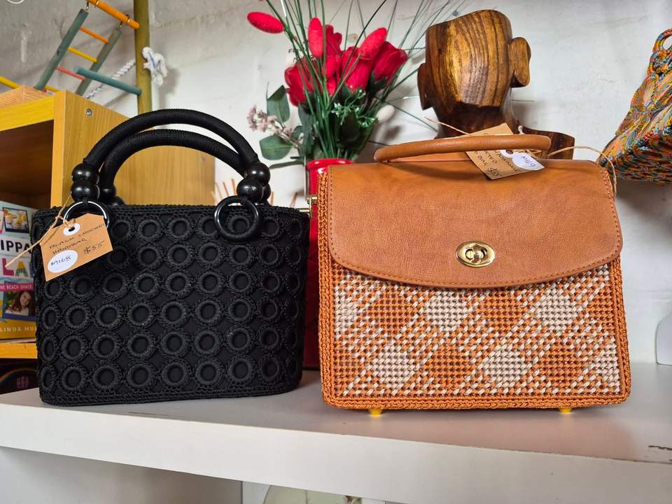 New handbags in store. Great for the races or other special occasions! Priced betwern  $55-$75.