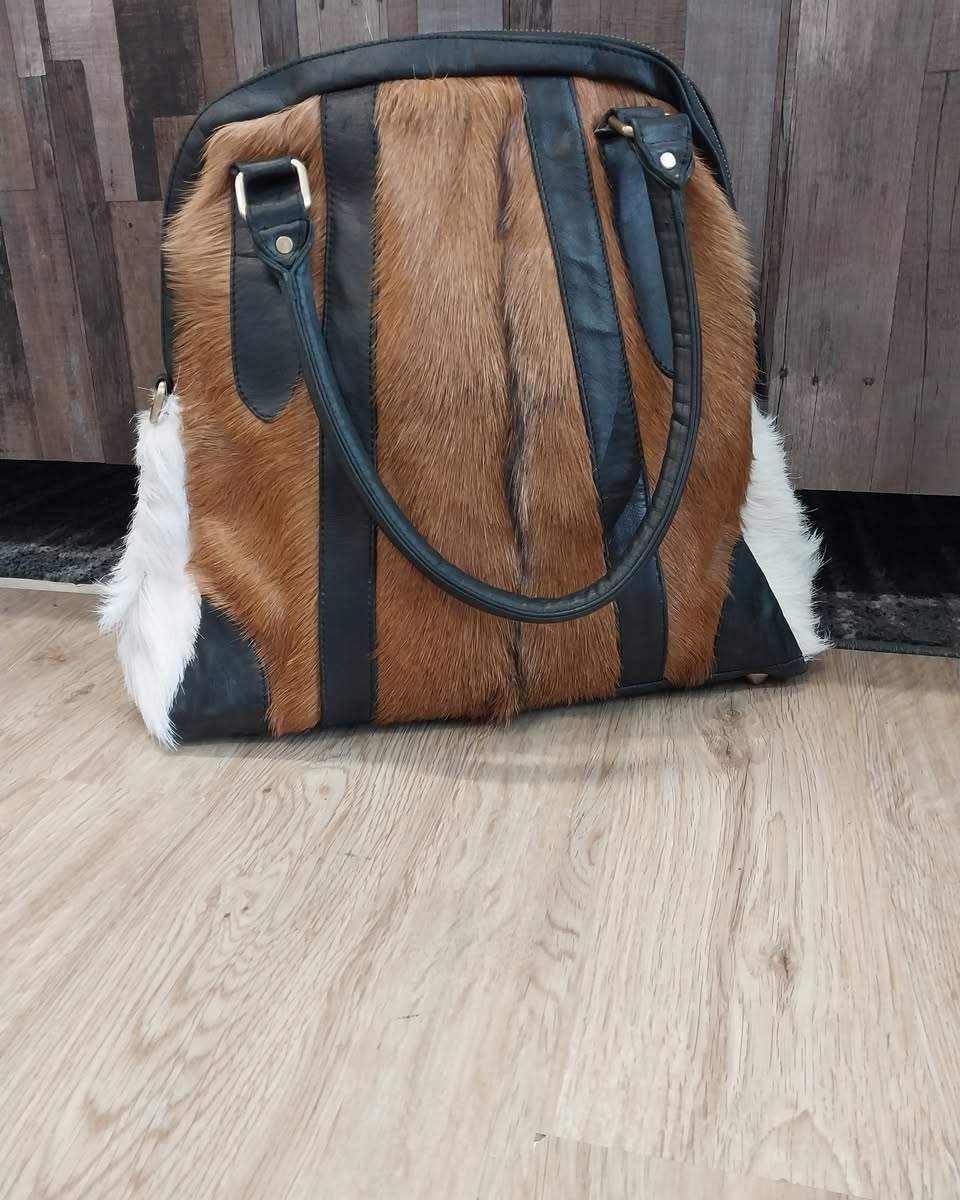 A selection of FURMOO bags is now in store at The Charity Corner.