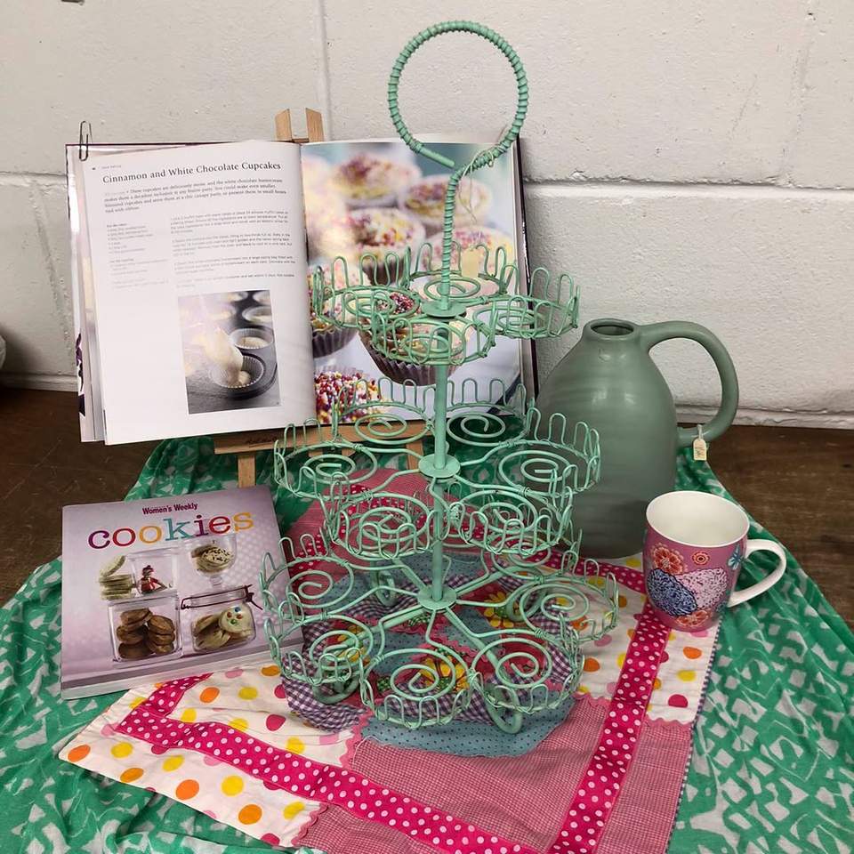 Cute green cupcake stand, lovely cookbooks to inspire.🧁 Red Geranium is at 486 Goodwood rd Cumberland Park SA