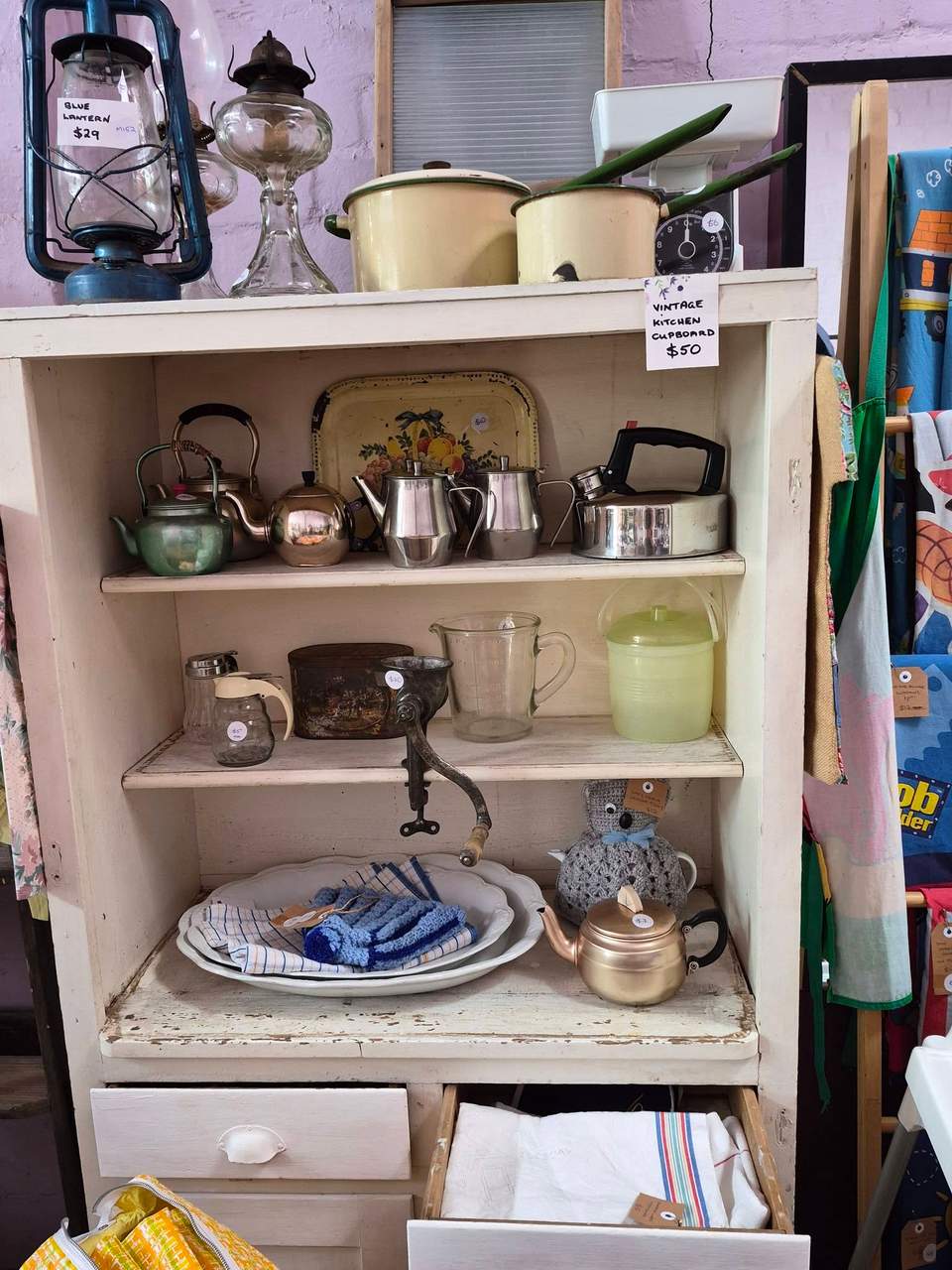 Vintage kitchen cupboard for sale $50. White book case with 5 shelves for sale $50.
