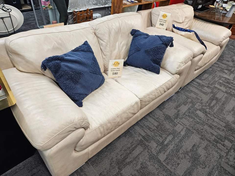 Fresh furniture and homewares are on the floor at St John Tauranga Store, including a cream leather two-seater couch for $80, a matching single-seater for $40 and a Sony Bravia television for $40.