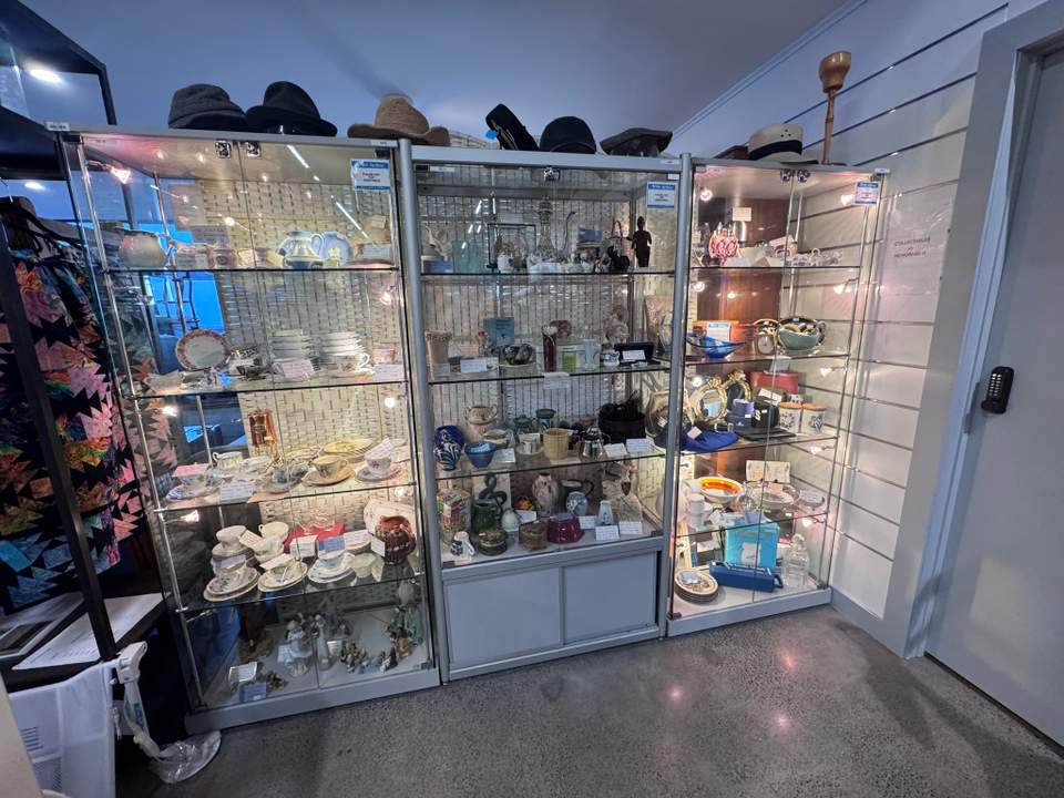 Much better location here and huge selection, especially lots of collectors items and designer furniture. Pricing seems reasonable on clothes