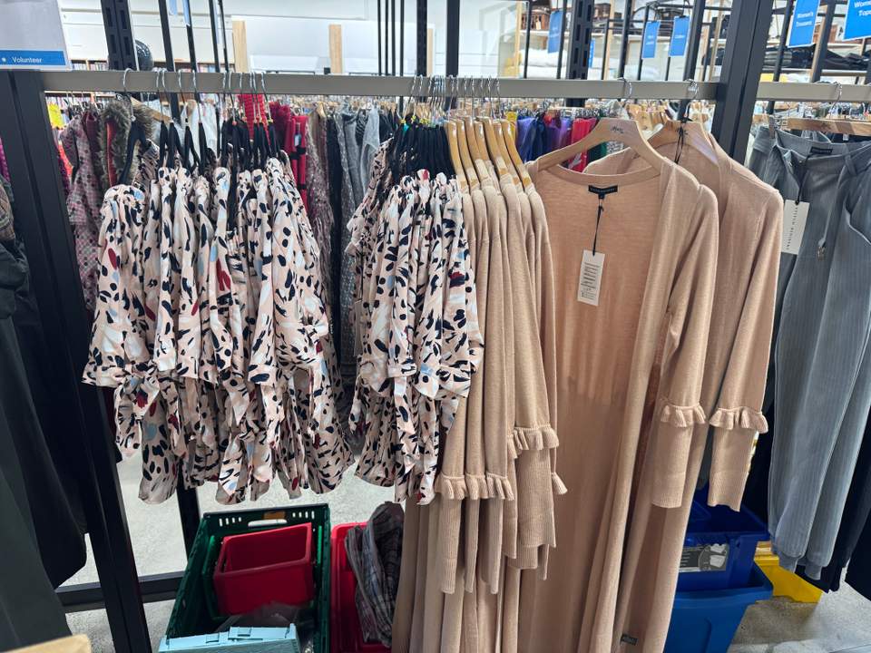 Much better location here and huge selection, especially lots of collectors items and designer furniture. Pricing seems reasonable on clothes