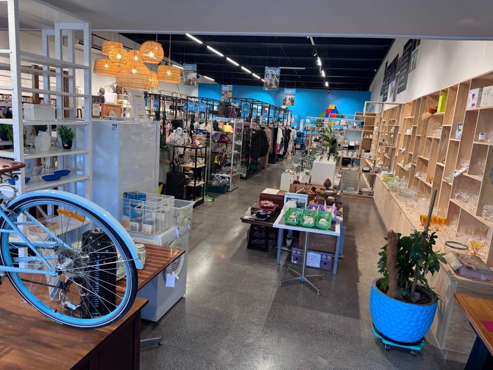 Much better location here and huge selection, especially lots of collectors items and designer furniture. Pricing seems reasonable on clothes