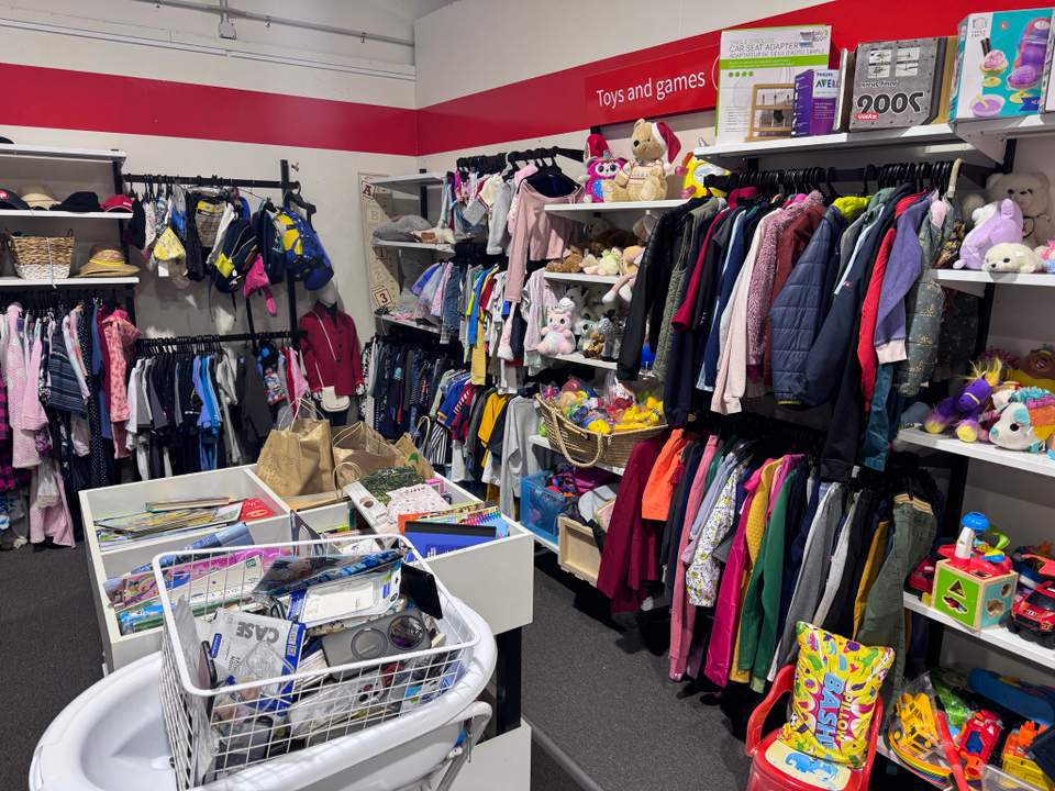 Massive store organised by size, lots of ladies and men’s wear, kids clothes, furniture and art
